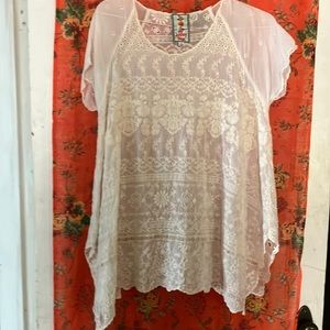 Johnny was tunic top size XS  23” pit to pit